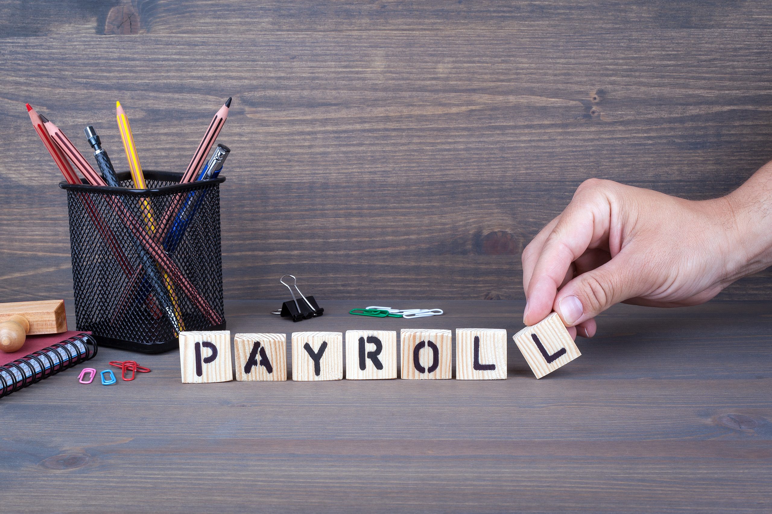 Payroll.,Wooden,Letters,On,Dark,Background Motor expenses you can claim if you are self-employed